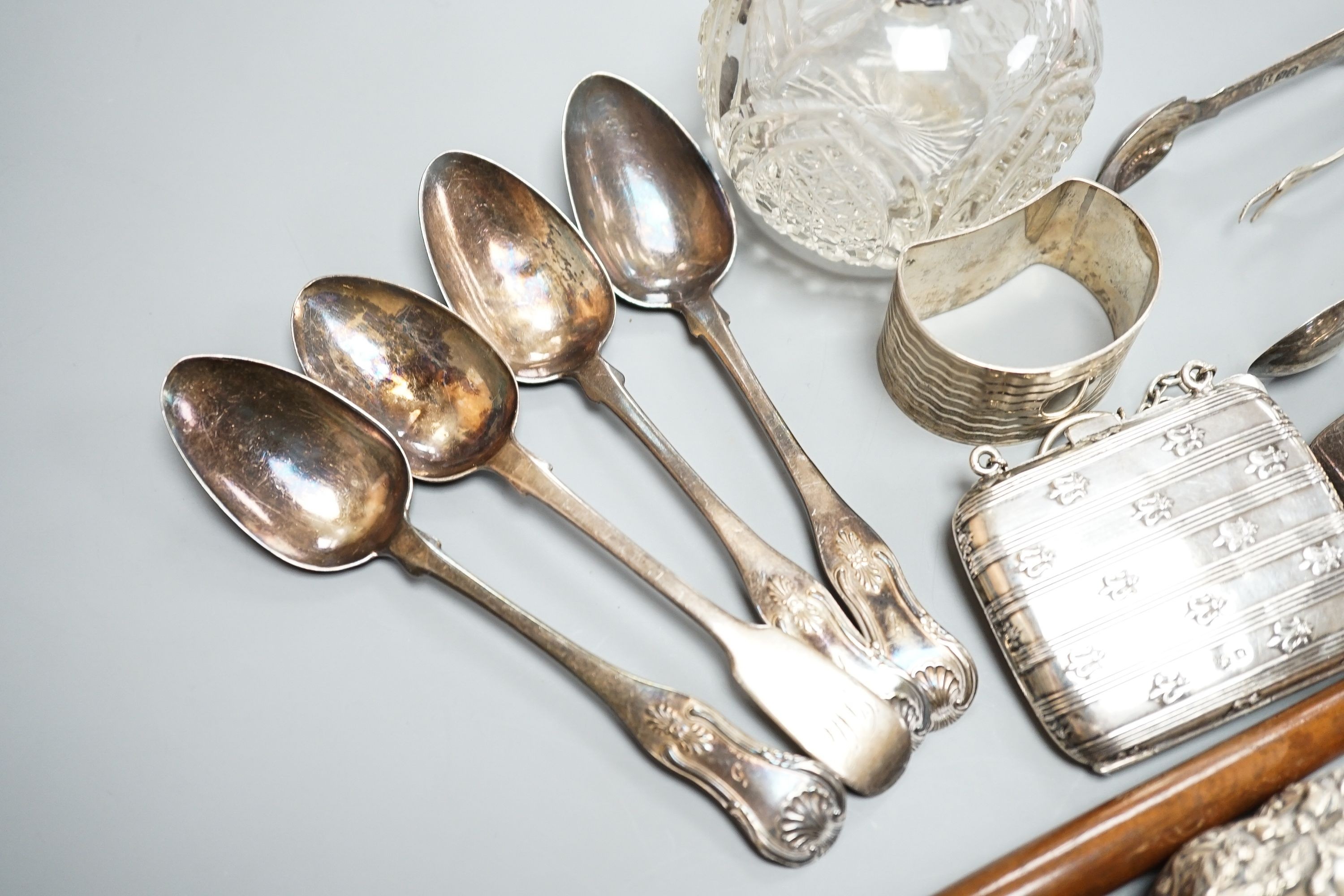 An 18th century silver toddy ladle, with wooden handle(a.f.) and a group of small silver including flatware, napkin ring, scent bottle, repousse box and cover and purse.